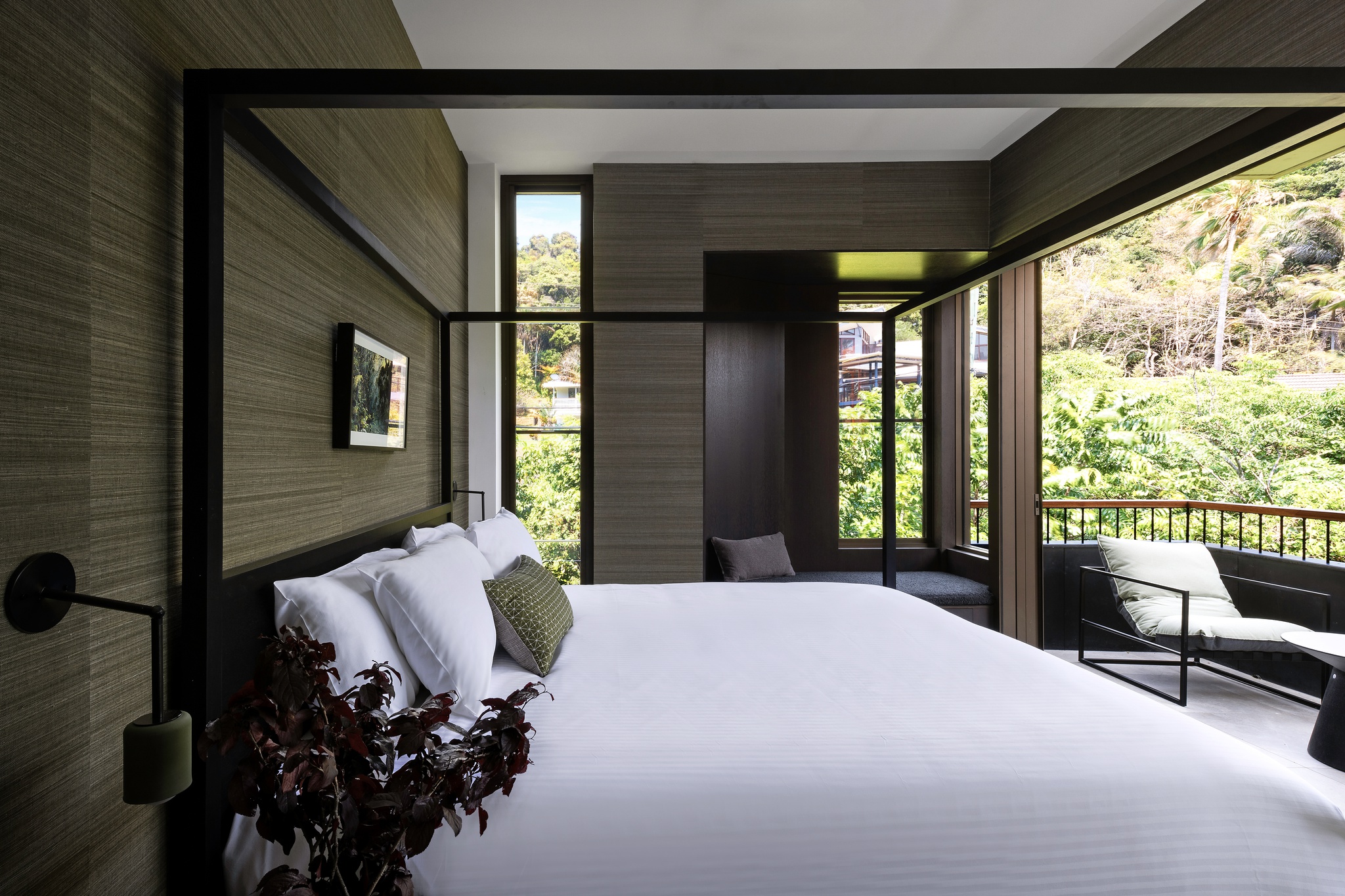 Starfall bedroom with four-poster and rainforest view